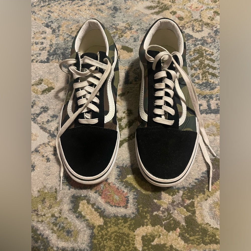 Size 8.5 women’s black and camo lace up vans